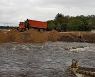 Устранение последствий паводка на участке трассы Р-297 Амур в ЕАО продолжается