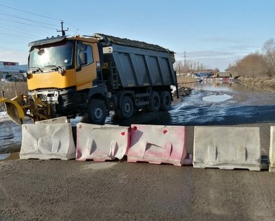 В Дзержинске перекрыт участок Чернореченской объездной дороги из-за подтопления